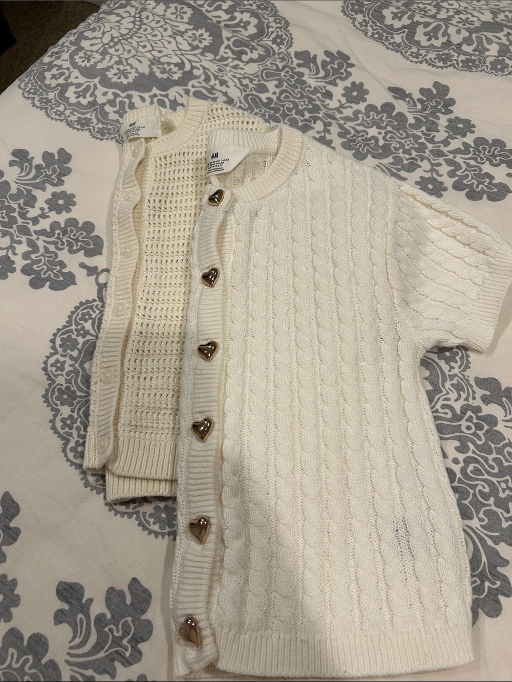 Bundle of 2 H&M girls short sleeve sweaters. Size 6x/7.